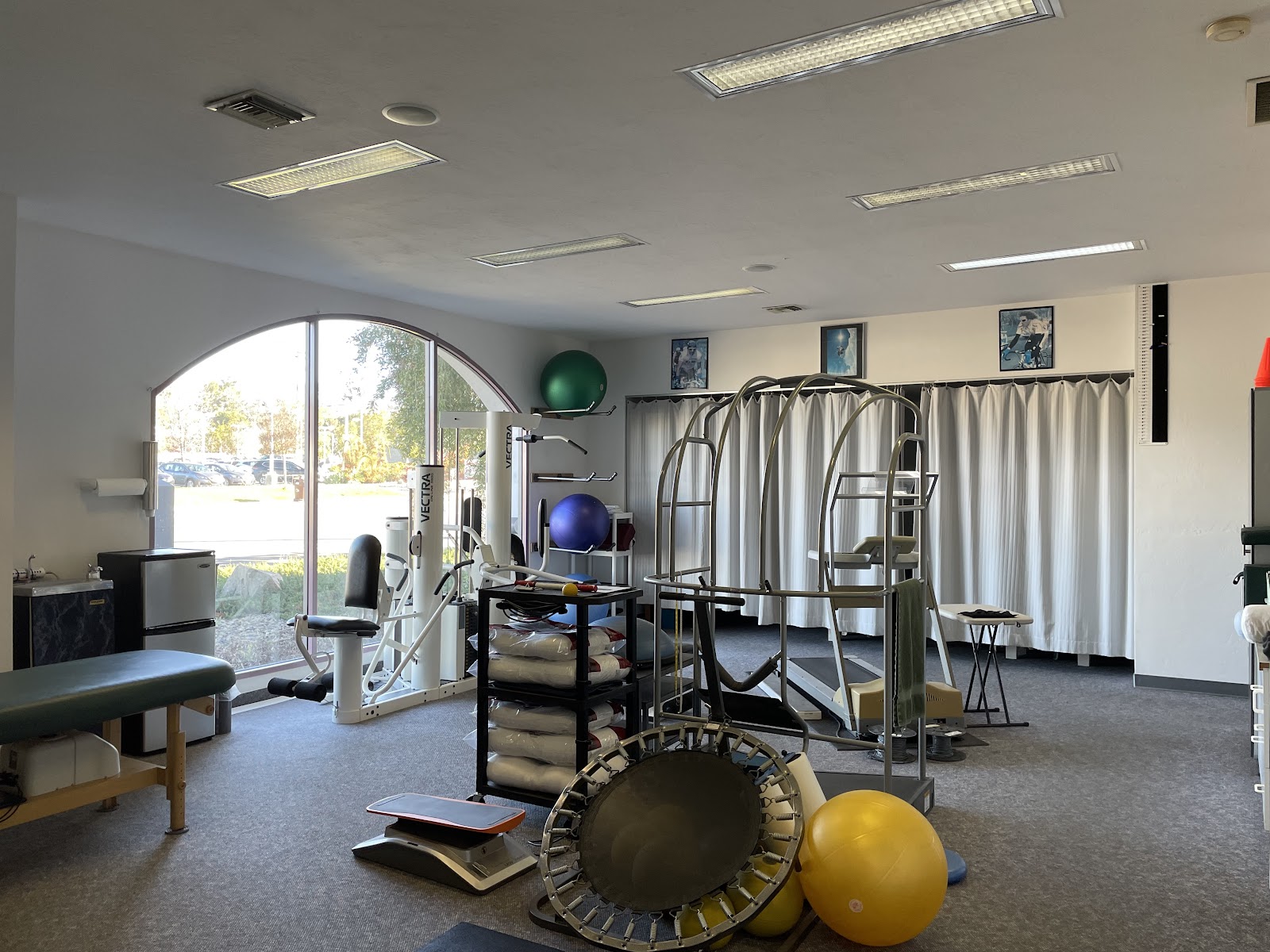 Adjusting tables and equipment inside our Poway treatment room